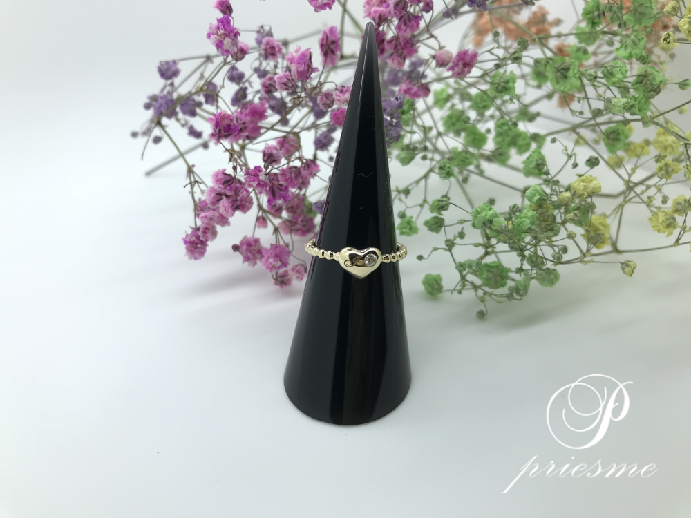 Diamant guld ring formet som hjerte
